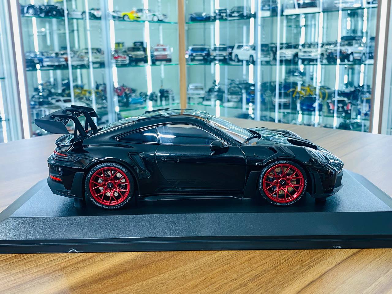 1/18 Diecast Minichamps Porsche 911 (992) GT3 RS 2023 in Black with Red Wheels