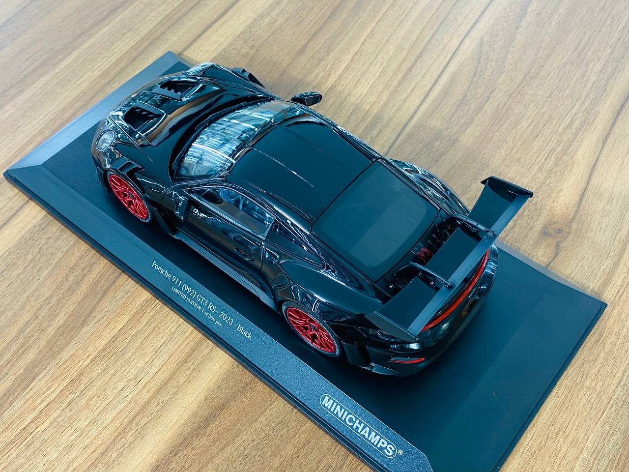 1/18 Diecast Minichamps Porsche 911 (992) GT3 RS 2023 in Black with Red Wheels