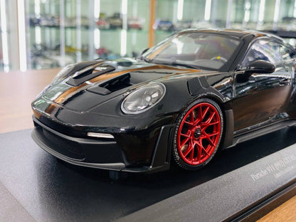 1/18 Diecast Minichamps Porsche 911 (992) GT3 RS 2023 in Black with Red Wheels