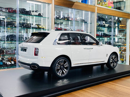 1/8 scale Amalgam Rolls-Royce Cullinan in a pristine white finish with luxurious maroon interior