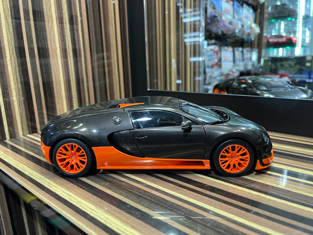 AutoArt Bugatti Veyron 16.4 Super Sport - 1/18 Diecast Model,Black Carbon/Orange sold in Dturman.com Dubai UAE.