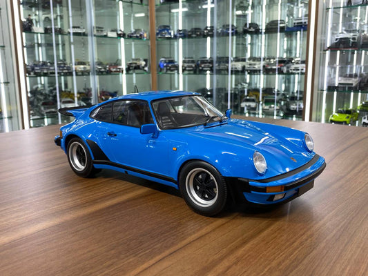 1/12 Diecast Model – Porsche 911 Turbo (1977) by Minichamps