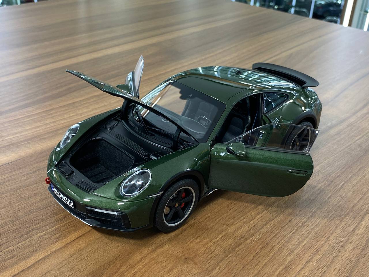 1/18 diecast metal Norev Porsche 911 Dakar 2023 in Oak-green metallic